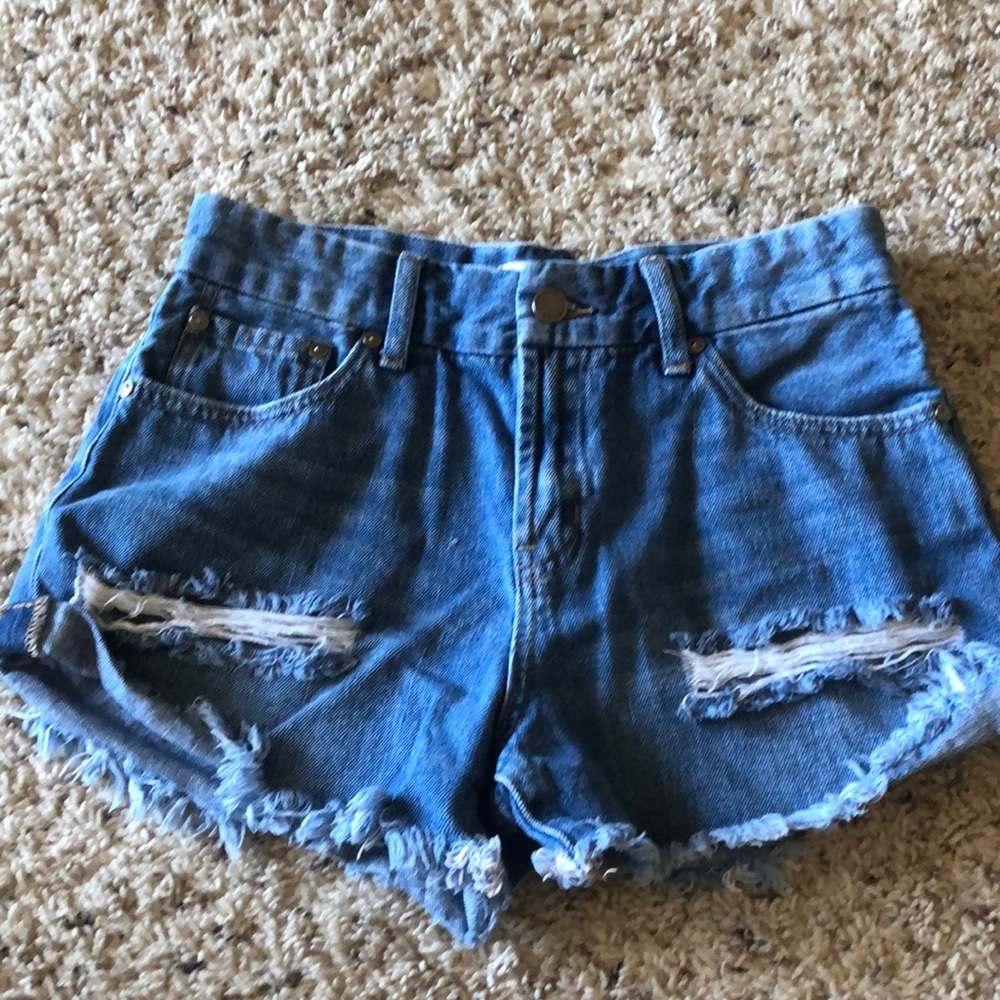 DISTRESSED DENIM SHORTS